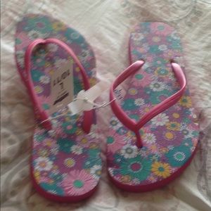 Pink floral flip flops
